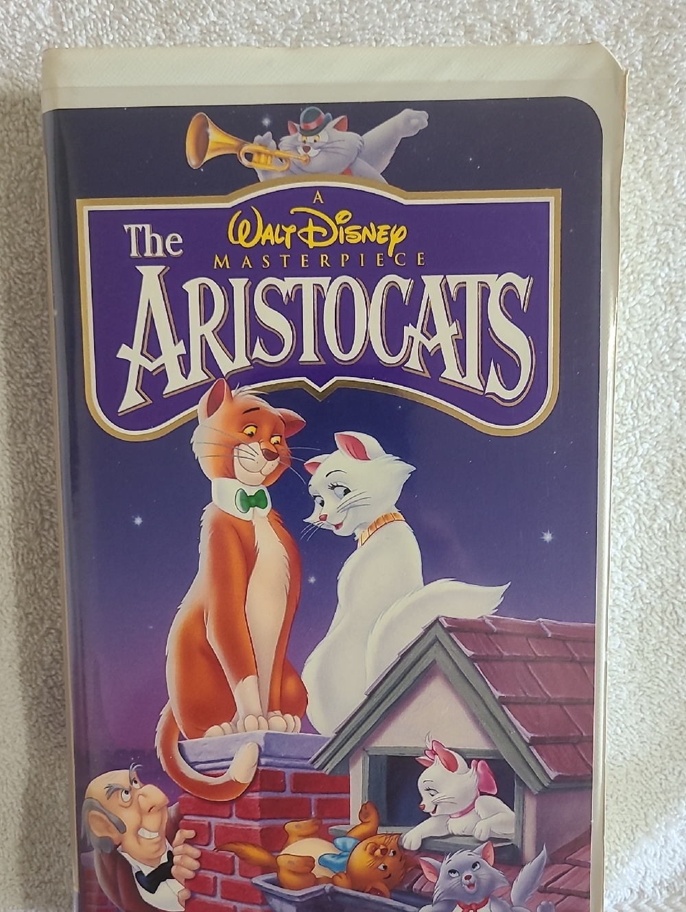 Disney Aristocats VHS Cover – Purple Artwork with Orange and White Cats